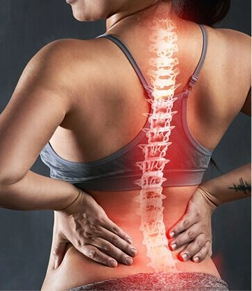 Woman with spine pain problem